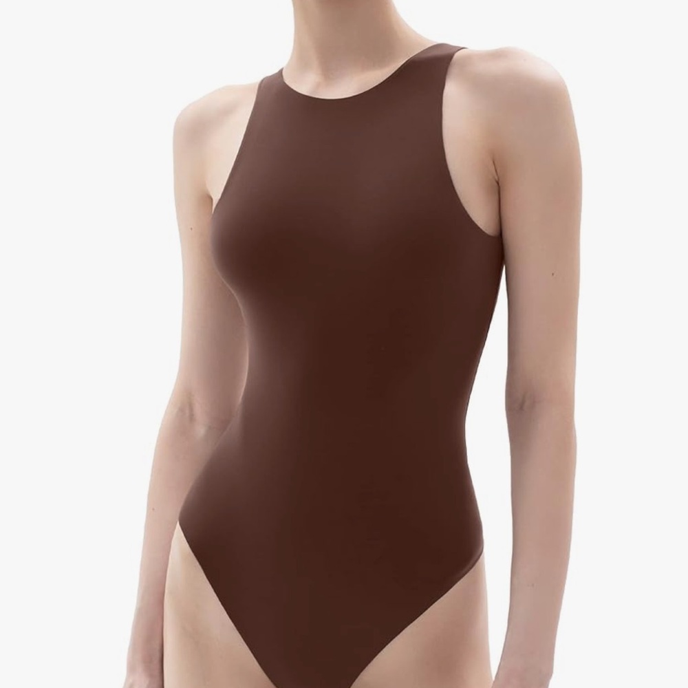 Brown size large body suit new looks great under jeans, short skirts